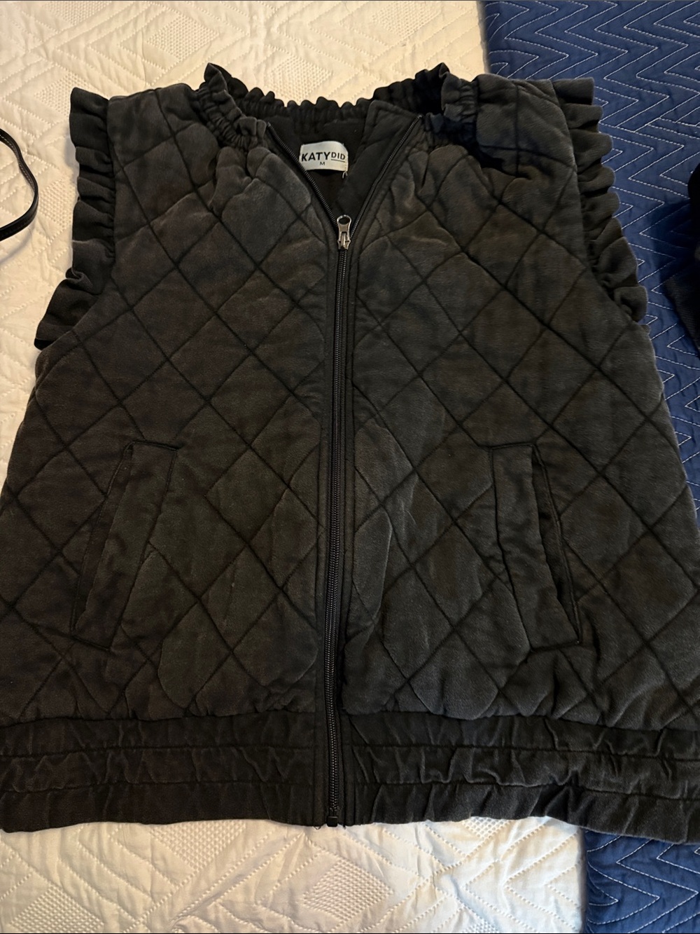 Katydid Black Quilted Ruffle-Trim Vest